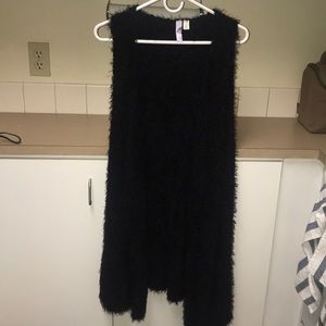 Long sleeveless sweater